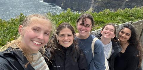 The caption could be: "Julia Rock-Torcivia (second from the right) with fellow research assistants at the University of Galway in Ireland where she was an intern during summer 2024"